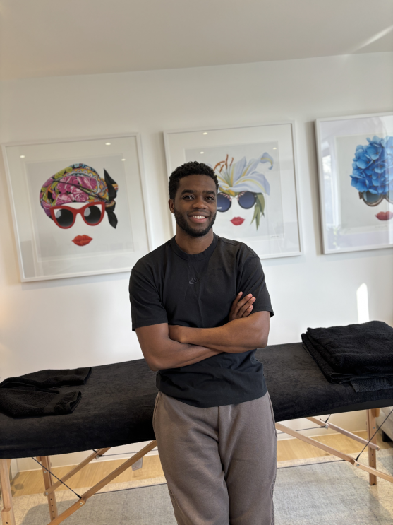 Bertie with a mobile massage bed at your home in London